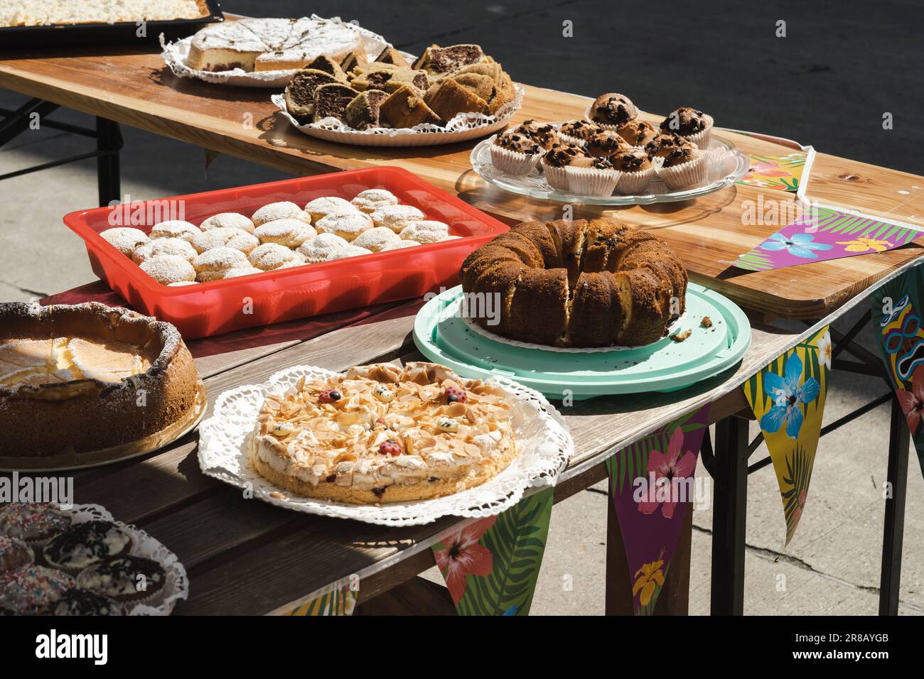 Assorted desserts including cakes, pastries and muffins on a table